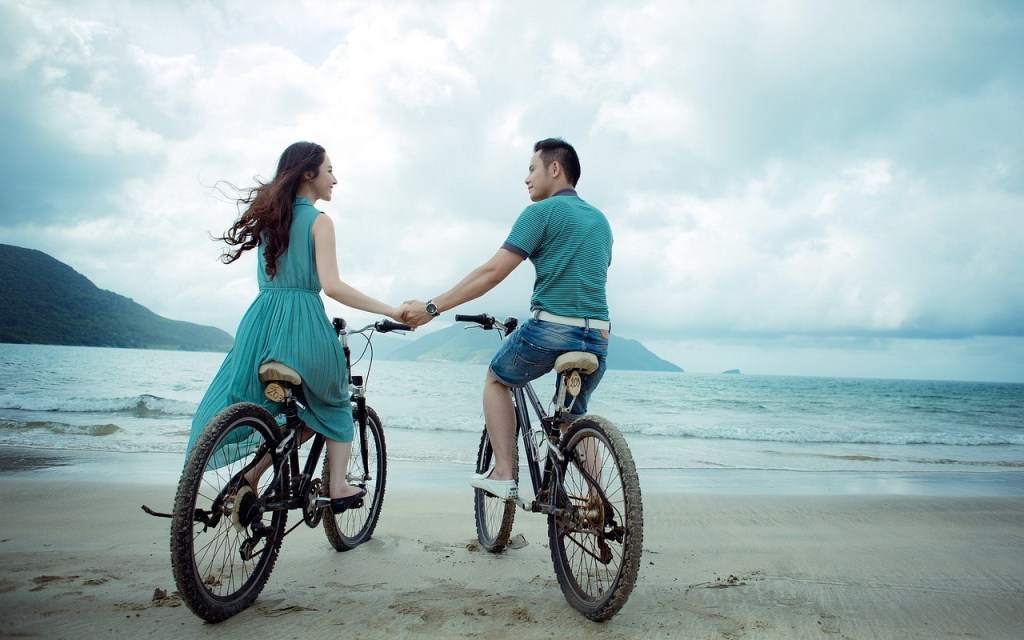 Relationship Goals holding hands biking together